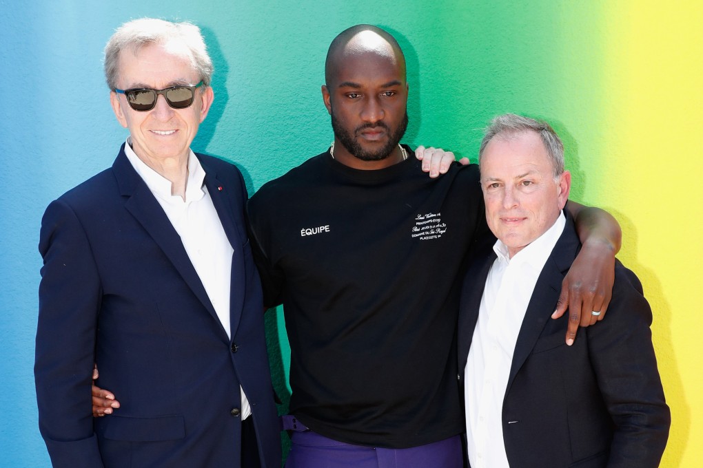 From left: LVMH owner Bernard Arnault, designer Virgil Abloh and Louis Vuitton CEO Michael Burke in Paris in 2018. We talk to Burke about LV’s future and the role China and Hong Kong play in that. Photo: Getty Images