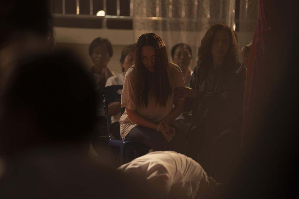 Narilya Gulmongkolpech (centre) in a still from The Medium (category III: Thai), co-starring Sawanee Utoomma and directed by Banjong Pisanthanakun