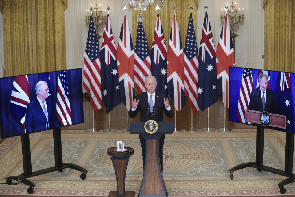 US President Joe Biden delivers remarks in the East Room of the White House in Washington on September 15, as Australian Prime Minister Scott Morrison (left) and British Prime Minister Boris Johnson (right) join in virtually. Photo: EPA-EFE