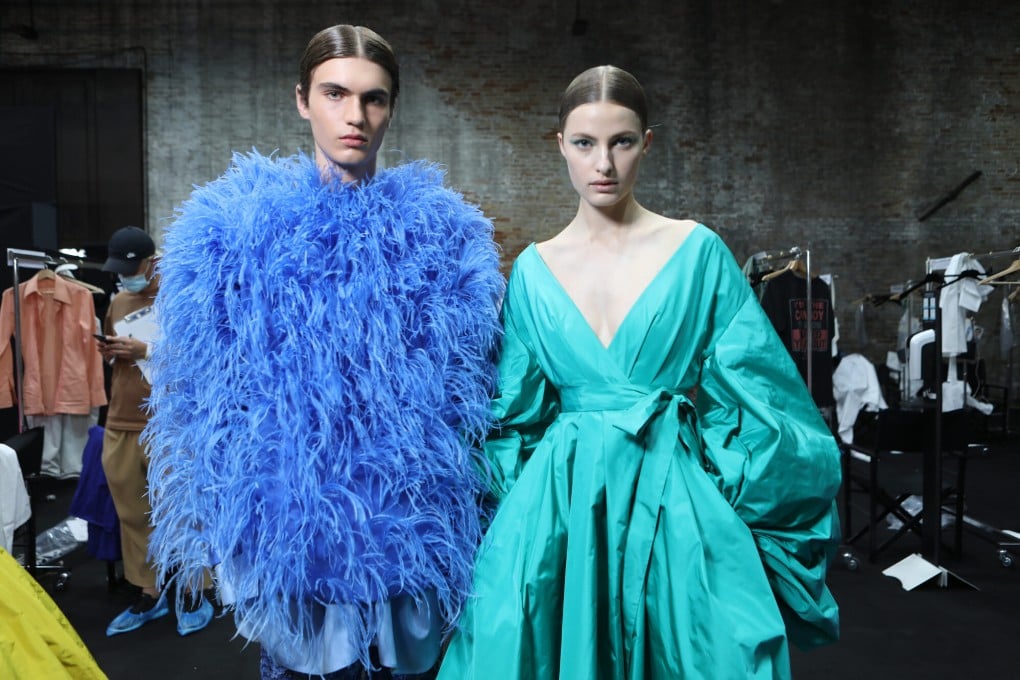 Looks from Valentino’s autumn/winter 2021 collection. This season’s fashion collections are full of bright hues, marking a move away from the pandemic’s neutrals.