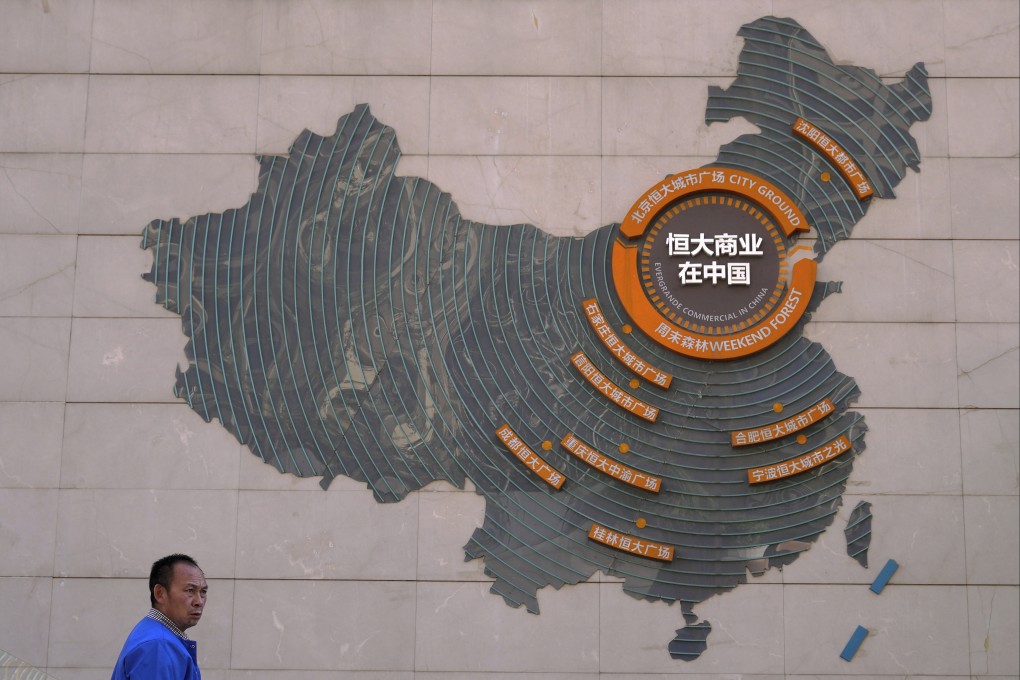 A map showing Evergrande development projects in China, at an Evergrande city plaza in Beijing. Photo: AP