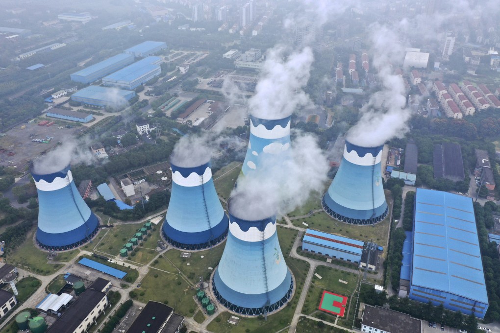 Steam billows out of the cooling towers at a coal-fired power station in Nanjing in east China’s Jiangsu province. Photo: AP