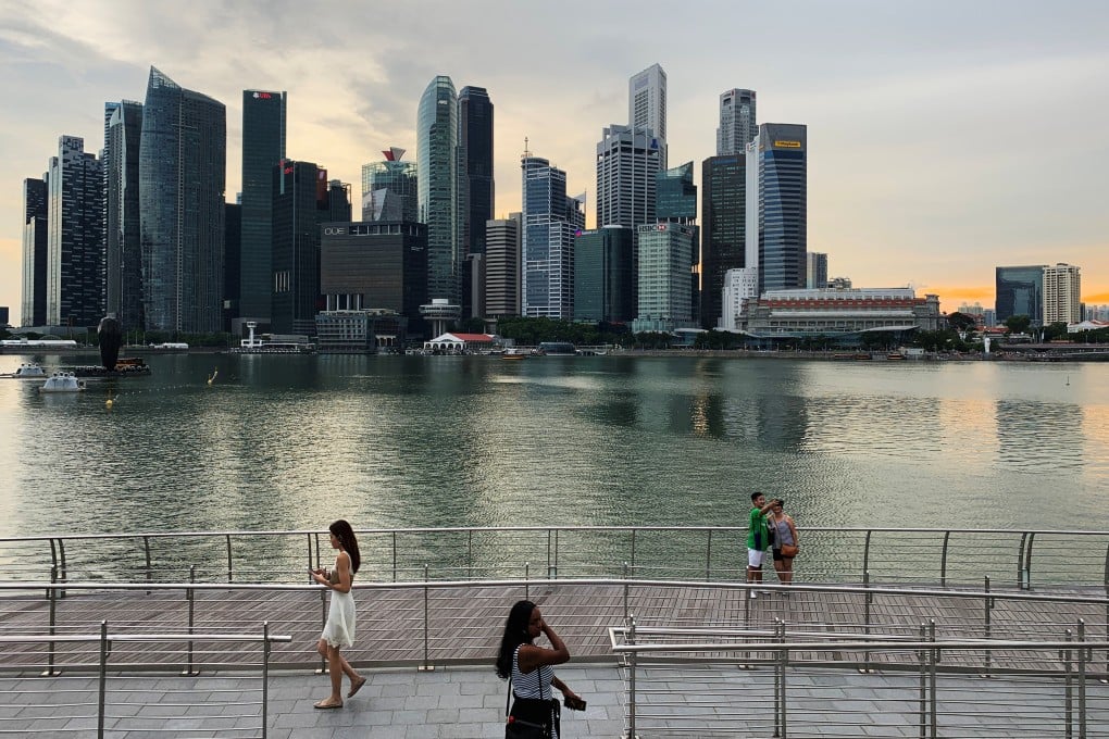 Pedestrians in Singapore’s central business district. Photo: Reuters