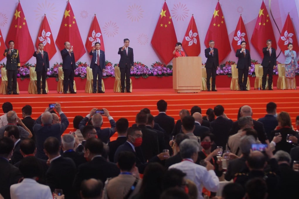Chief Executive Carrie Lam (at the podium) leads current and former Hong Kong and central government officials in a toast at a National Day reception at the Hong Kong Convention and Exhibition Centre in Wan Chai on October 1. Photo: Winson Wong