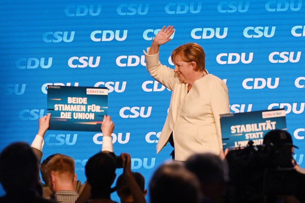 German Chancellor Angela Merkel waves to the crowd at an election rally in Munich on September 24. During her time in office, she has come to symbolise the stability and predictability for which Germany is renowned. Photo: DPA