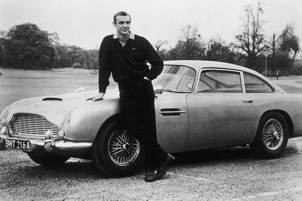 Sean Connery on the set of Goldfinger (1964) with his character James Bond’s famous 1964 Aston Martin DB5. Photo: Bettmann Archive
