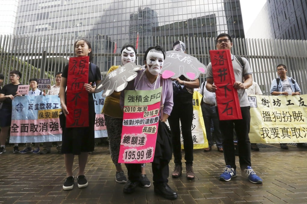 Demonstrators appeal to the Legislative Council to scrap the Mandatory Provident Fund offset mechanism outside the central government offices in Tamar on June 24, 2017. Photo: Jonathan Wong
