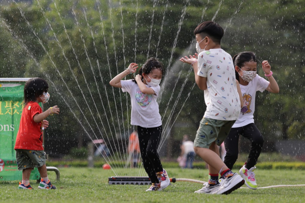 Children playing in Hong Kong’s Velodrome Park in Tseung Kwan O on May 13. Why is Hong Kong not following Beijing’s moves to reduce student workloads and crack down on private tutoring? Photo: May Tse