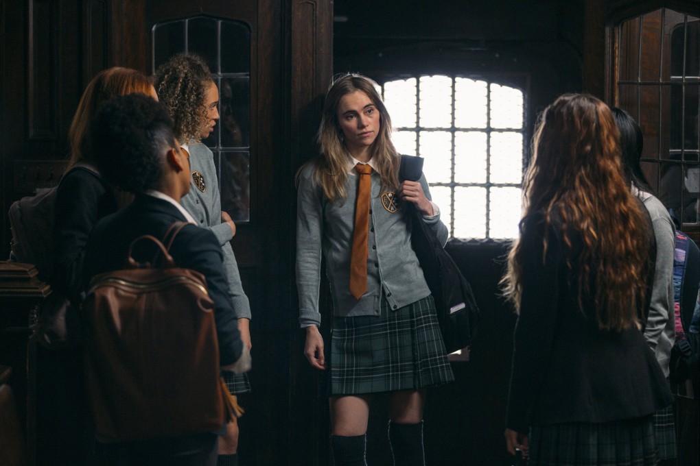 Suki Waterhouse (centre) plays a tough student in a still from Seance (category IIB), directed by Simon Barrett.
