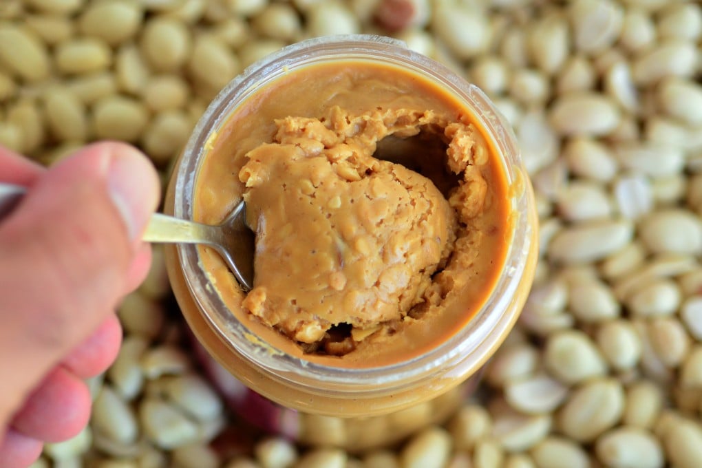 Don’t feel bad about spooning peanut butter from the jar – it’s a guilty delight that feels so wrong but is actually perfectly all right. Photo: Shutterstock