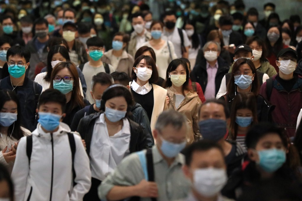 Commuters in masks at Hong Kong MTR station on April 9, 2020. The city needs a new, holistic strategy to maintain a competitive workforce. Photo: May Tse