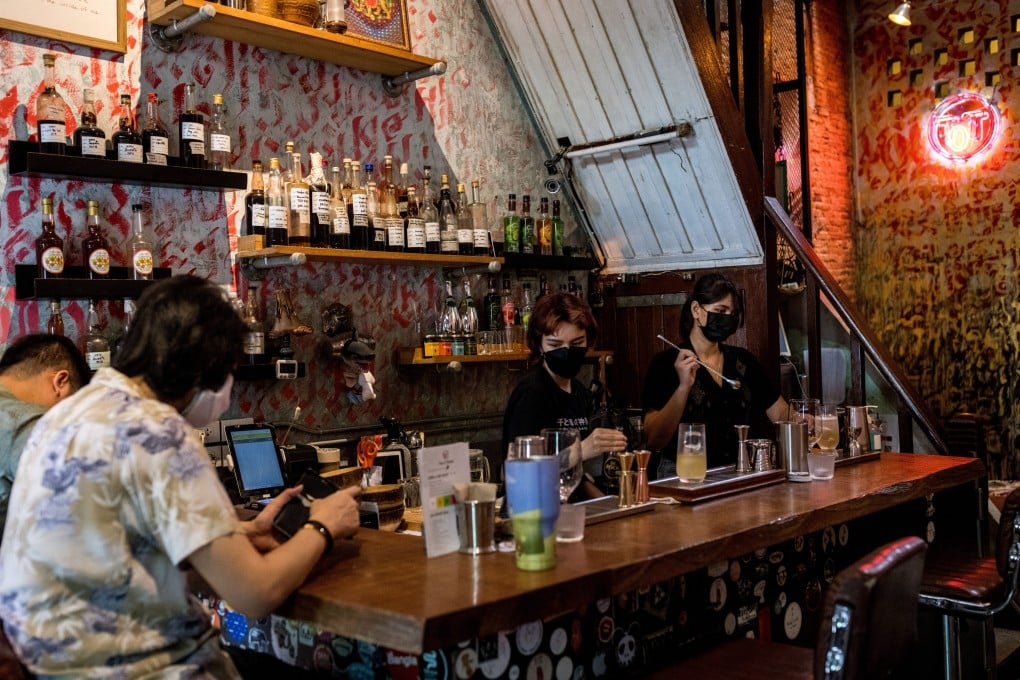 Customers at Teens of Thailand cocktail bar in Bangkok enjoy fruity mocktails as the Covid-19 alcohol ban continues there. Photo: AFP