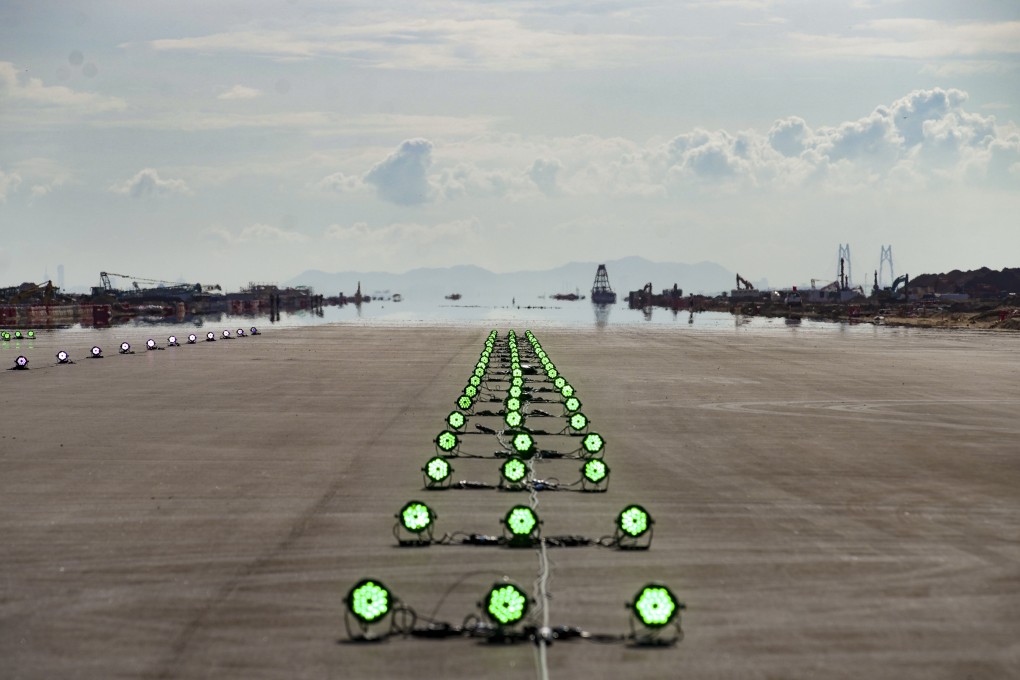 The newly completed tarmac area of the third runway is seen at a Hong Kong International Airport ceremony on September 7. The reclamation techniques used in the runway’s construction could have benefits elsewhere in Hong Kong. Photo: Winson Wong