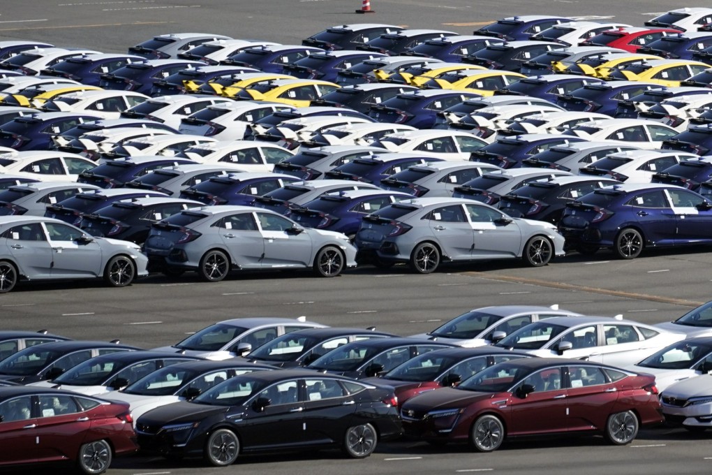 New vehicles for export are parked at a port in Yokohama, near Tokyo, Japan, on December 8, 2020. While Japanese exports rose 13 per cent year on year in September, car shipments have plummeted. Photo: EPA-EFE
