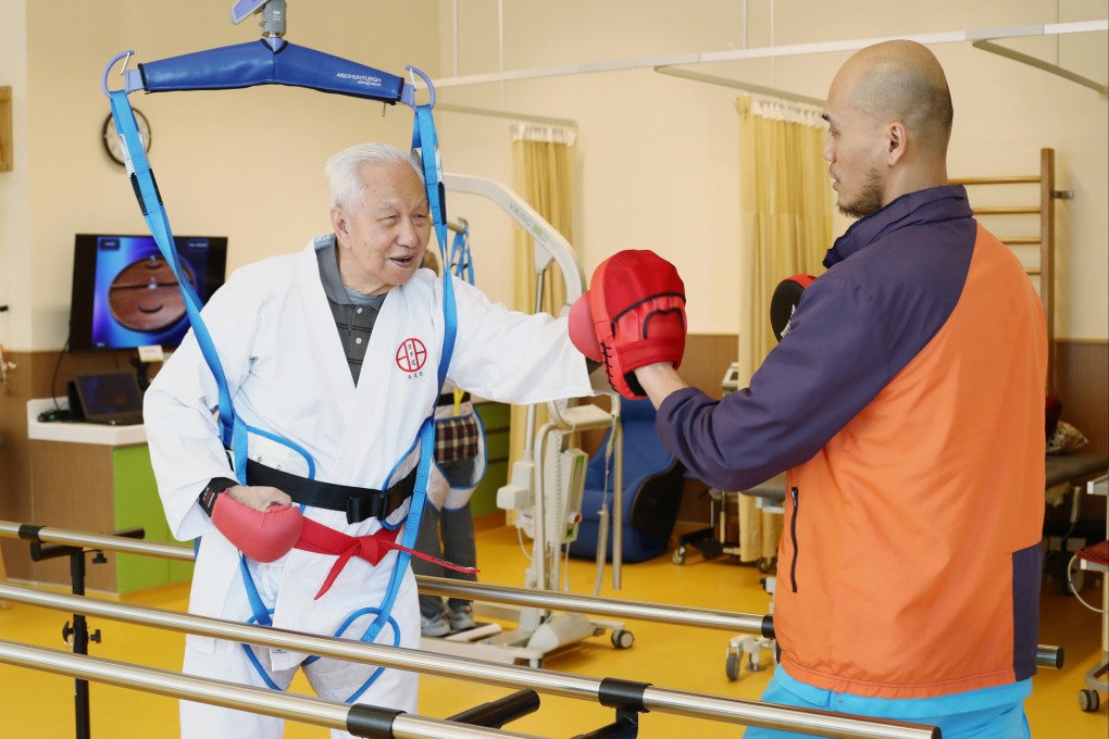 A physiotherapist works with a patient at the TWGHs Jockey Club Sunshine Complex for the Elderly in Wong Chuk Hang in 2018. Photo: Nora Tam