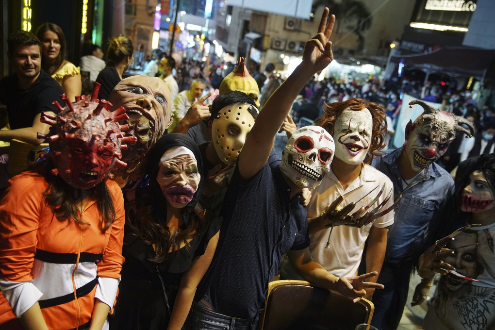 People dressed in various costumes enjoy Halloween night at Lan Kwai Fong in October, 2020. It’s columnist Andrew Sun’s worst nightmare. Photo: Winson Wong