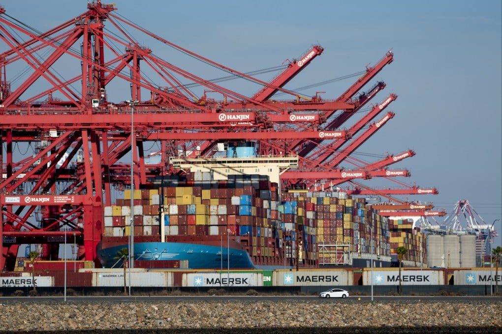 Shipping containers are unloaded at the Port of Long Beach, California, on October 24. The head of the port has advised Americans to buy their holiday gifts early this year as the container glut plaguing ports and supply chains will persist through to the end of the year at least. Photo: Bloomberg