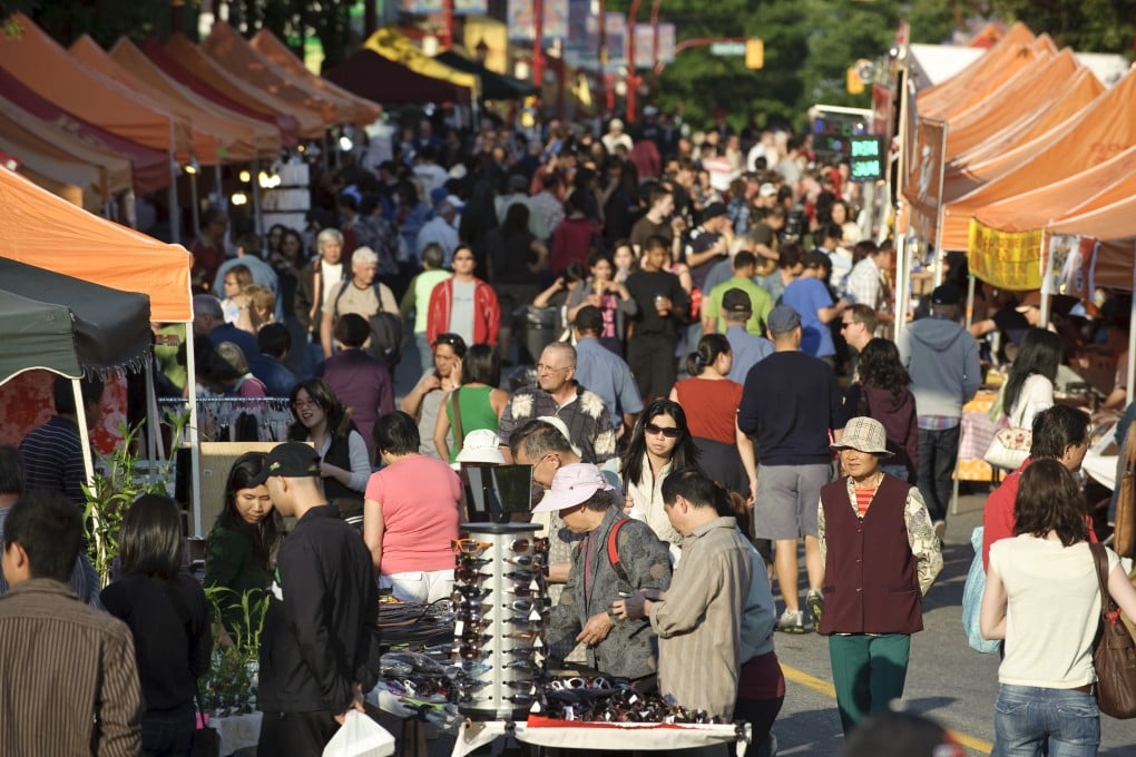 A market in Vancouver’s Chinatown. The narrator of Pik-Shuen Fung’s novel Ghost Forest grows up there, with her father staying behind in Hong Kong. His death makes her realise how little she knew about him - and about her Chinese heritage. Photo: Getty Images