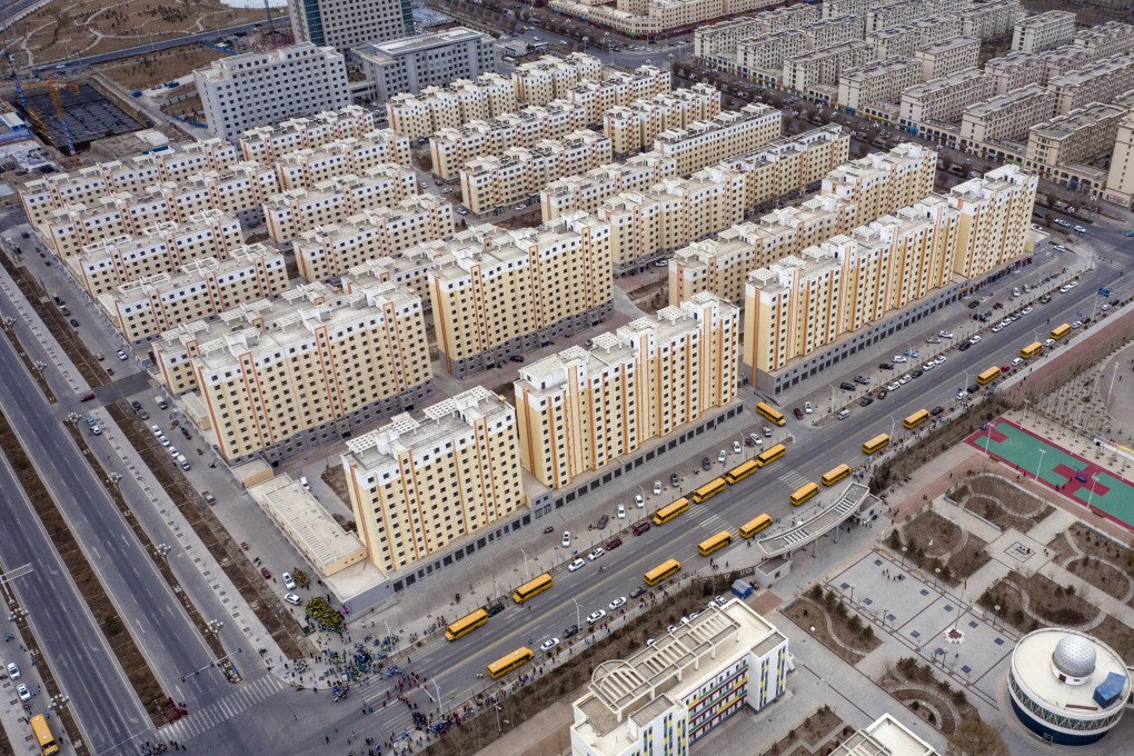 Residential buildings in Yumen, Gansu province, on March 31. While China is expected to approve plans for a nationwide property tax, its roll-out is expected to be graduate with several pilot programmes. Photo: Bloomberg