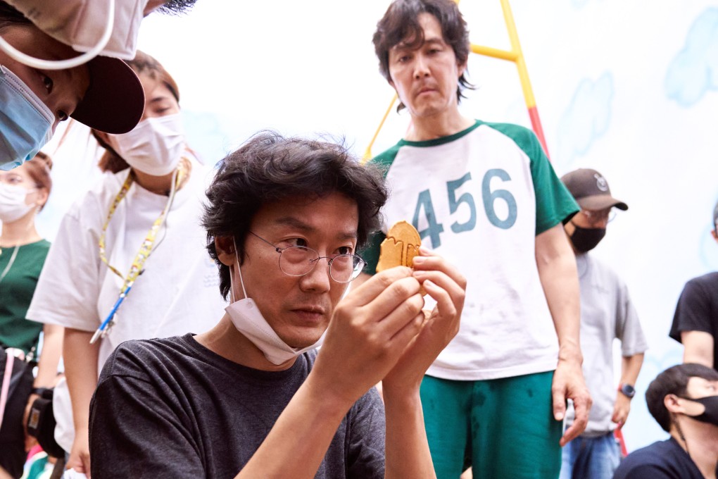 Squid Game creator and director, Hwang Dong-hyuk (left), and its star Lee Jung-jae on the set of the Netflix smash hit series. Photo: Netflix