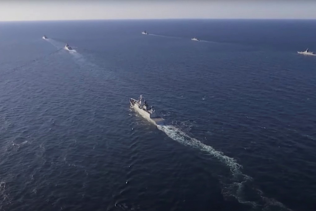 Naval vessels from China and Russia sail during a joint military drill in the Sea of Japan, in this video still released on October 18. Photo: Russian Defence Ministry/Reuters