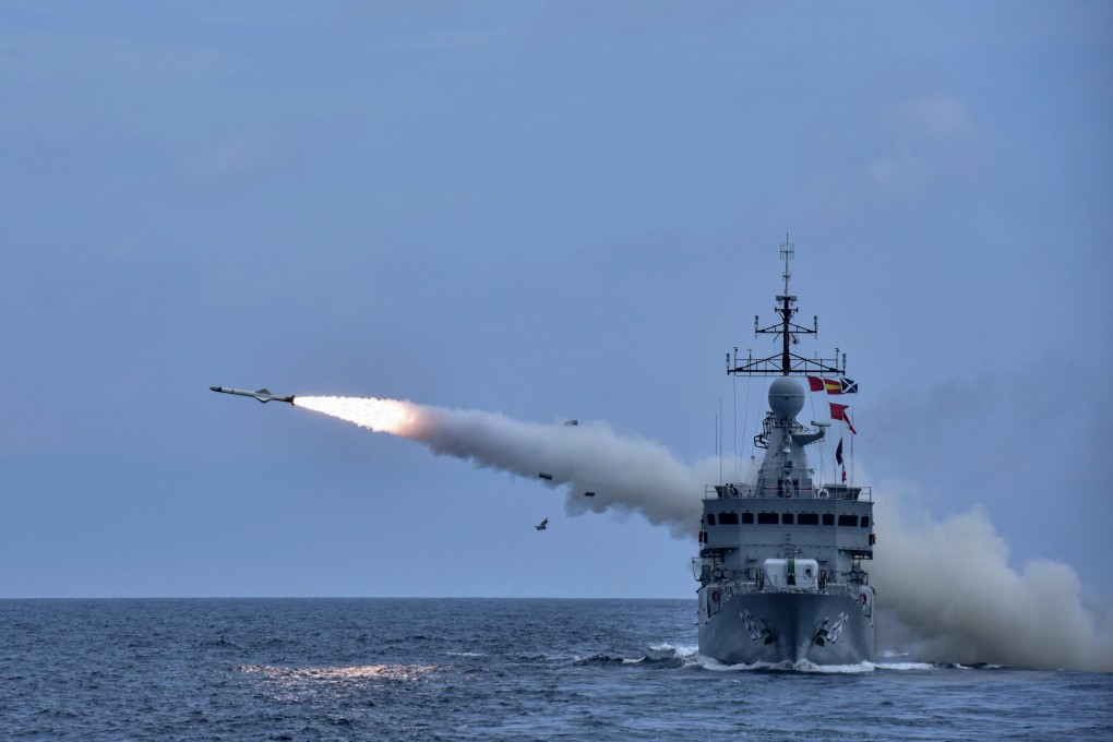 A Kasturi-class corvette of the Royal Malaysian Navy fires a missile during a military exercise in the South China Sea on August 12. Photo: DPA