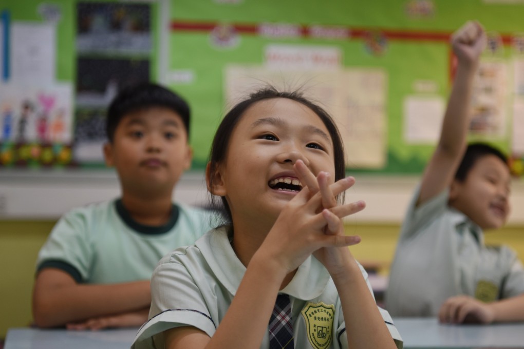 Students attend an English class at a secondary school in Hong Kong in May 2017. Photo: Xinhua