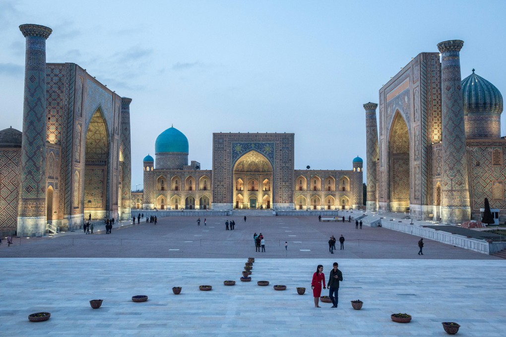 People gather at Registan Square in Samarkand, Uzbekistan, on March 4, 2018. The country was part of the ancient Silk Road, trading routes connecting China with Central Asia, the Middle East, Africa and Europe. China’s Belt and Road Initiative aims to revive and extend those routes via networks of upgraded or new railways, ports, pipelines, power grids and highways. Photo: Bloomberg