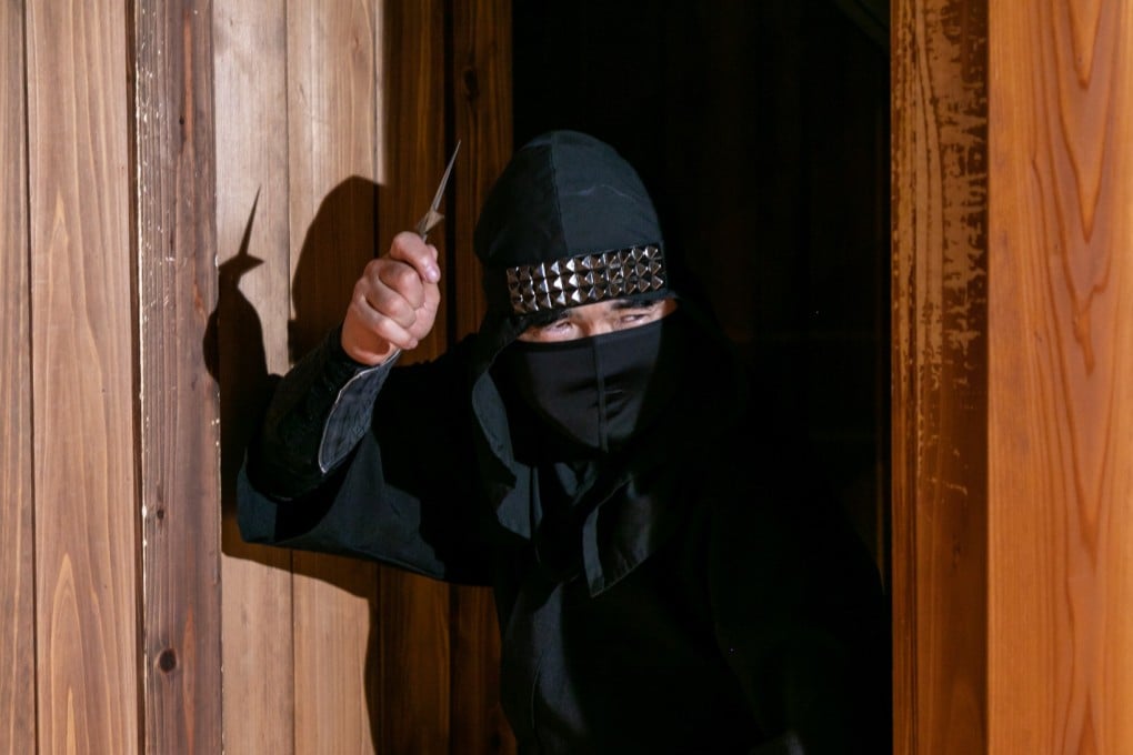 Hiroshi Jinkawa, one of the leading scholars and practitioners of the ninja arts in Japan, prepares to throw a shuriken, but those who attend his classes will discover that the ninja rarely used them as weapons.