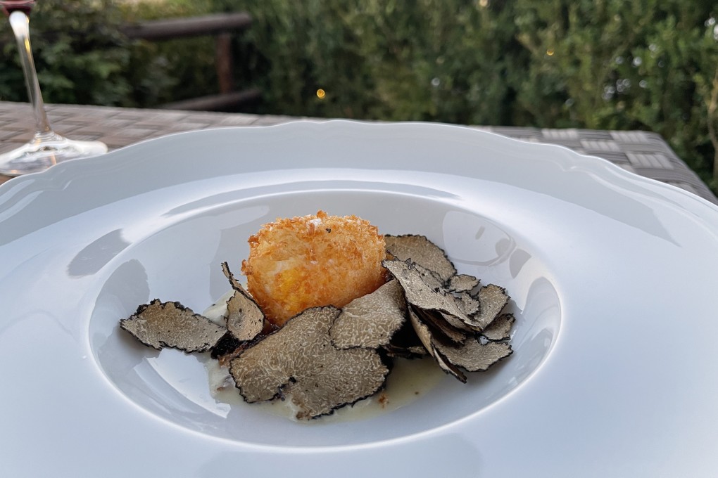 Crumbed egg with black truffle at the Como Castello del Nero hotel in Tuscany, Italy, where visitors can arrange truffle-hunting experiences. Photo: Chris Dwyer