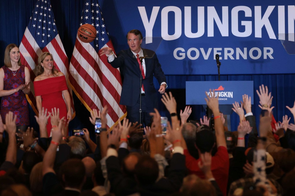 Glenn Youngkin passes an autographed basketball into the crowd at his election night rally in Chantilly, Virginia, on November 2. Youngkin defeated Democrat candidate, former governor Terry McAuliffe. Photo: AFP