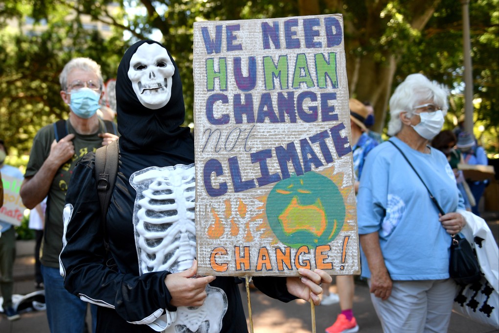 Protesters mark the Global Day of Action on Climate in Sydney, Australia, on November 6. Capital markets have a crucial role to play in driving companies along the path to net zero. Photo: AAP