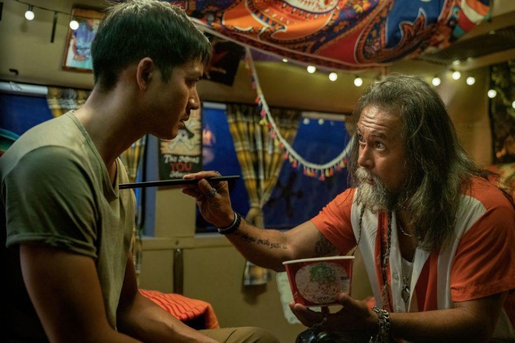 Sukollawat Kanarot (left) and Bhasaworn Bawronkirati in scene from gritty Netflix crime drama Bangkok Breaking. Photo: Netflix