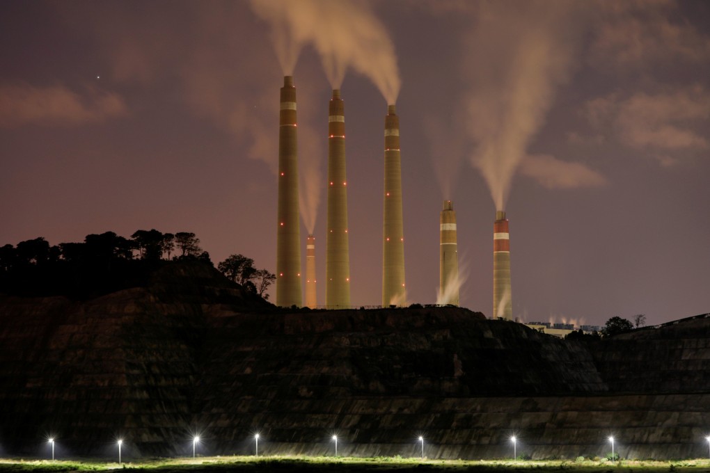 Smoke and steam billow from a coal-fired power plant owned by Indonesia Power, next to an area for Java 9 and 10, a coal-fired steam power plant project in Suralaya, Banten province, Indonesia, in 2020. Major banks are still providing capital and loans for coal projects. Photo: Reuters