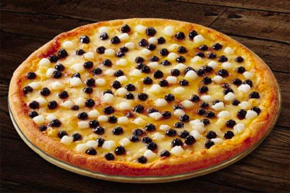 Pizza with black sugar pearls, a Taiwanese invention, is among the many novel offerings from pizza companies in Asia. Durian, bananas, sweet potato and spaghetti all feature.