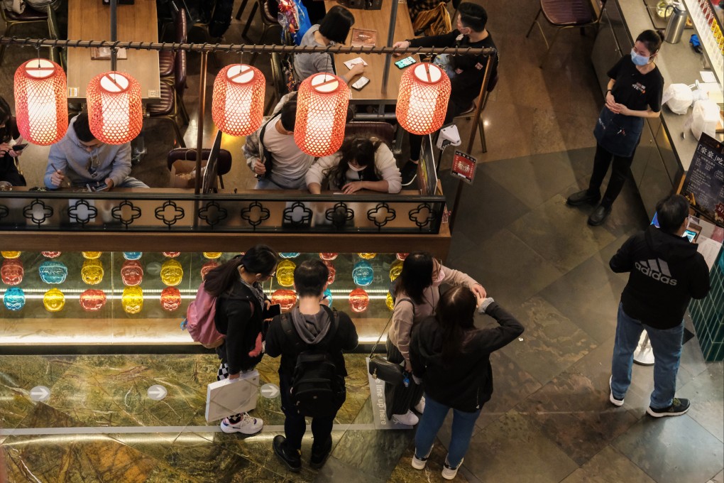 Customers line up for dinner outside a restaurant in Mong Kok on February 18. The F&B industry has been the major beneficiary of the “domestication” of Hong Kong’s retail market. Photo: Edmond So