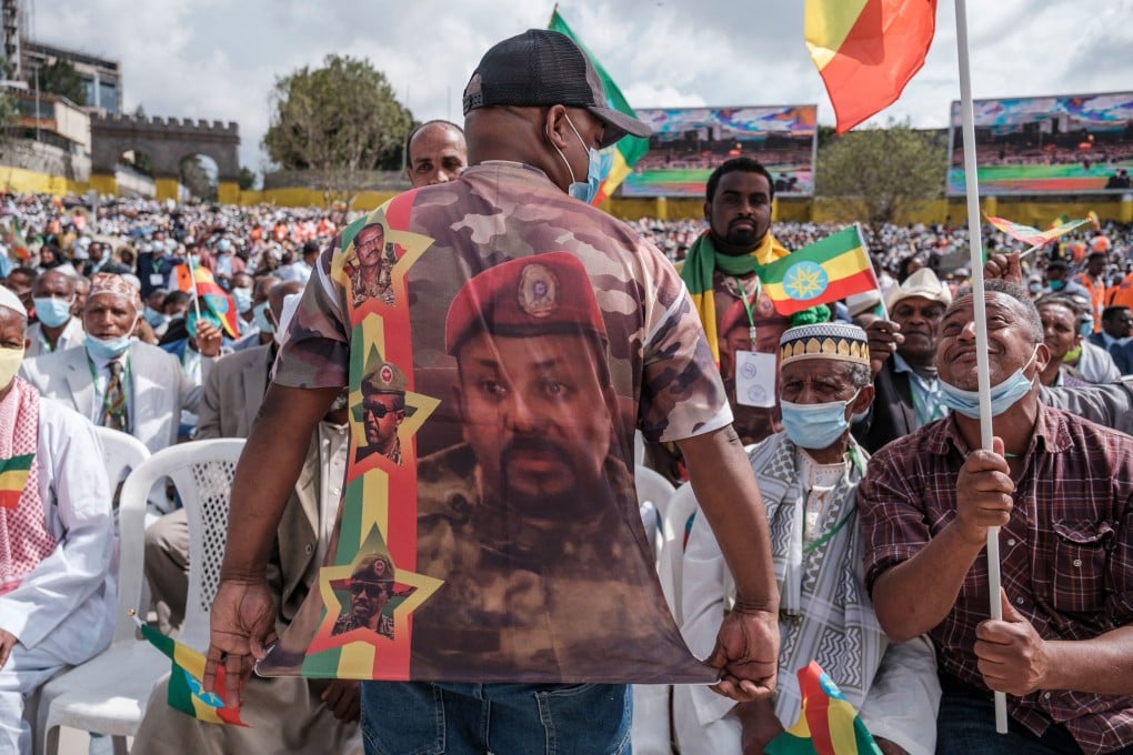 A man in a shirt depicting Ethiopian Prime Minister Abiy Ahmed is seen at the inauguration ceremony of the new government in Addis Ababa in October. Photo: TNS