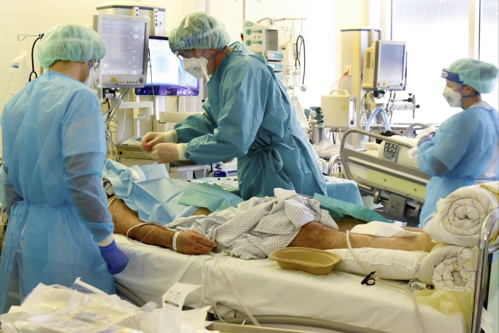 Health workers in an ICU ward at Leipzig University Hospital in Germany. Photo: dpa via AP