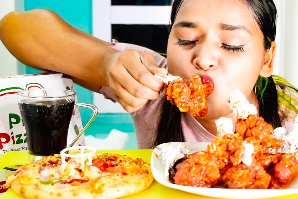 Chicken, omelettes, KFC and noodles – mukbang YouTubers like Deepika Verma (pictured) in India are eating it all as they tackle huge amounts of food in front of an online audience. Photo: courtesy Deepika Verma