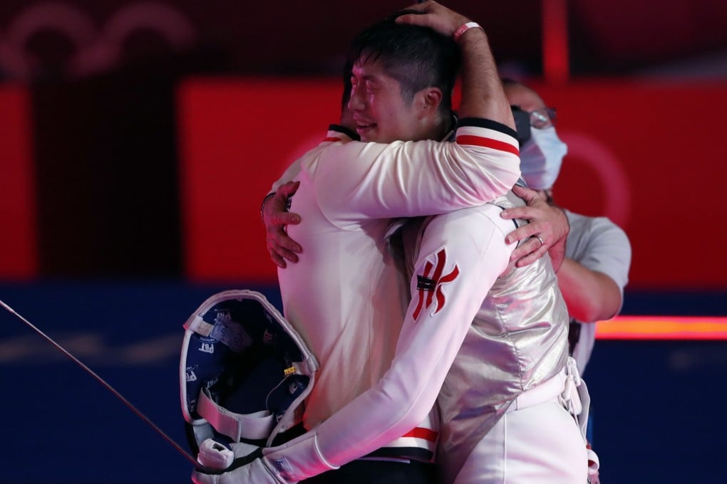 Hong Kong fencer Cheung Ka-long (right) and coach Greg Koenig after winning at the Tokyo 2020 Olympic Games men’s fencing individual foil final in Japan. Photo: EPA
