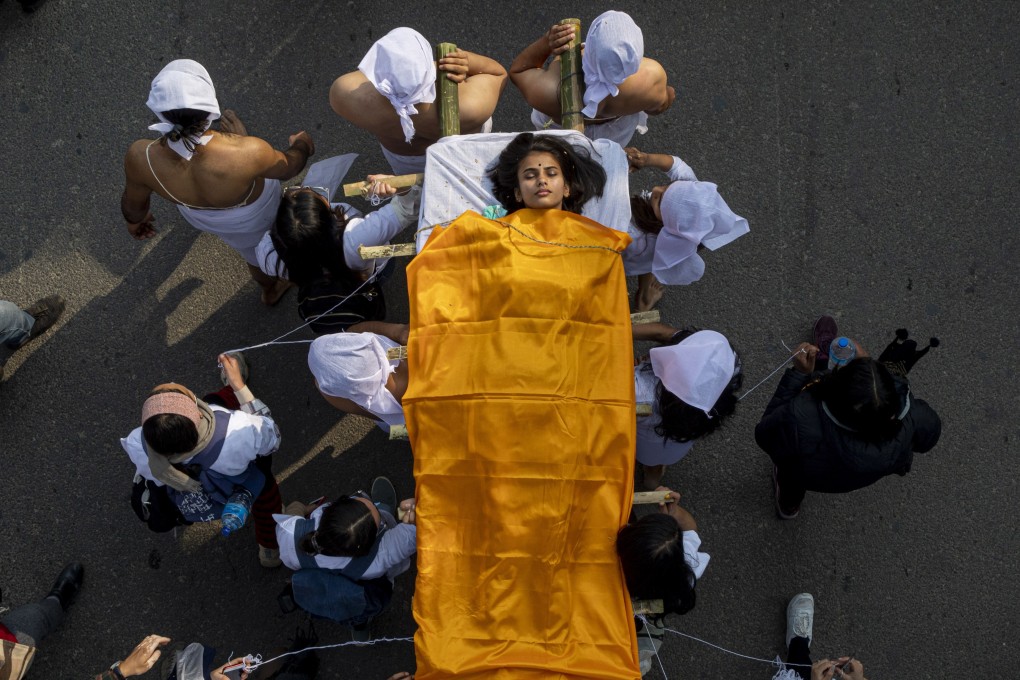 A mock funeral is staged in protest against rising cases of rape, murder and domestic violence against women in Kathmandu, Nepal, on February 12. Photo: EPA-EFE