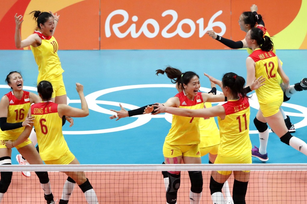 China women’s volleyball team player Liu Xiaotong (top left) celebrates with her teammates after their gold medal final win against Serbia at the 2016 Rio Olympic Games in Brazil. Photo: Xinhua