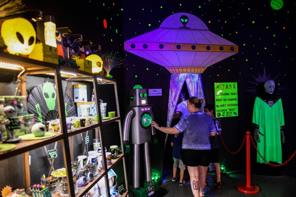 People enter the Roswell UFO Spacewalk attraction during the UFO Festival in New Mexico in July. Photo: AFP