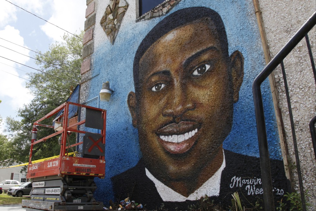 A mural of Ahmaud Arbery is seen in May 2020 in Brunswick, Georgia, where the 25-year-old man was shot and killed in February. Photo: AP