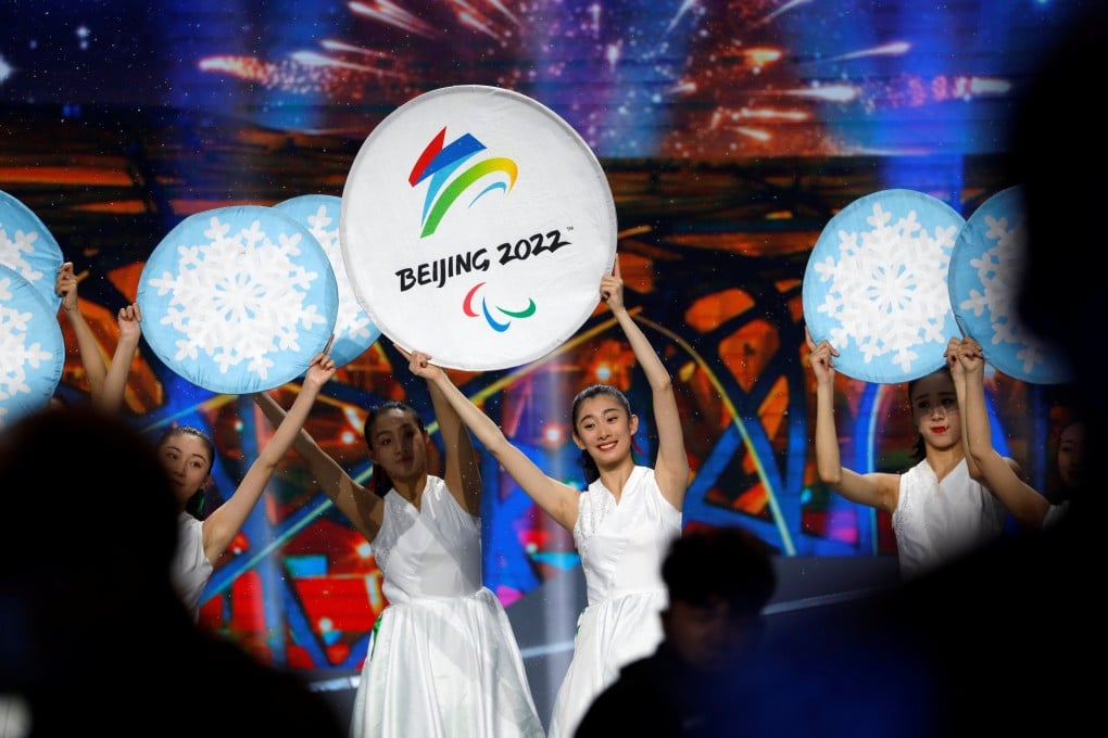 Artists perform with a sign of the 2022 Winter Olympics at an event in Beijing. Photo: Reuters