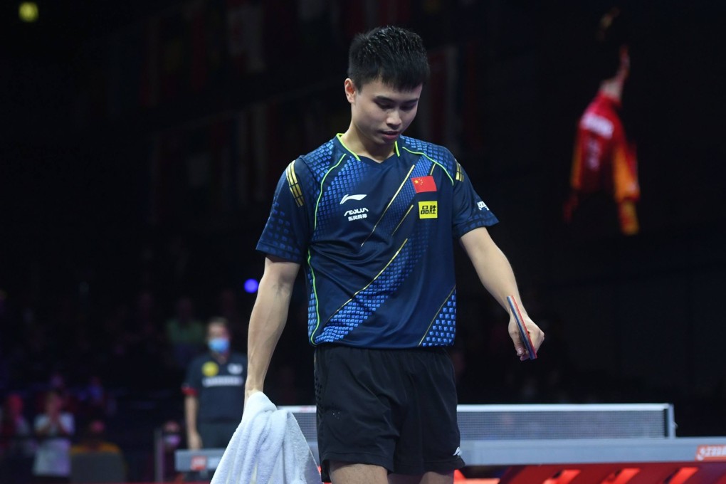 Zhou Qihao looks on after his defeat by Timo Boll at the 2021 World Table Tennis Championships in Houston. Photo: Xinhua