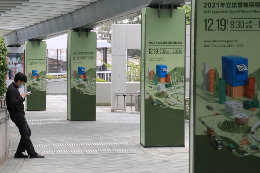 Posters promoting the upcoming Legislative Council election are seen in Admiralty on November 23. The lack of energy over the election is visible in the low voter enthusiasm and scarcity of candidates out on the streets. Photo: Felix Wong