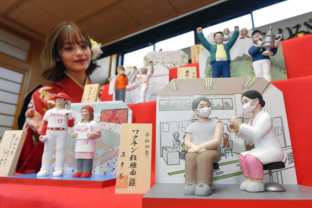 “Hina” dolls are unveiled by a doll maker in Tokyo, including a nurse giving a Covid-19 vaccine to a man. Japan is currently doing well in its fight against coronavirus, with only five new cases in its capital city on Wednesday. Photo: Kyodo