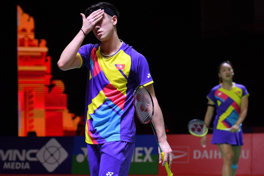Tang Chun-man (left) and Tse Ying-suet lost to Japans Yuta Watanabe and Arisa Higashino but still qualified for the World Tour finals. Photo: AFP