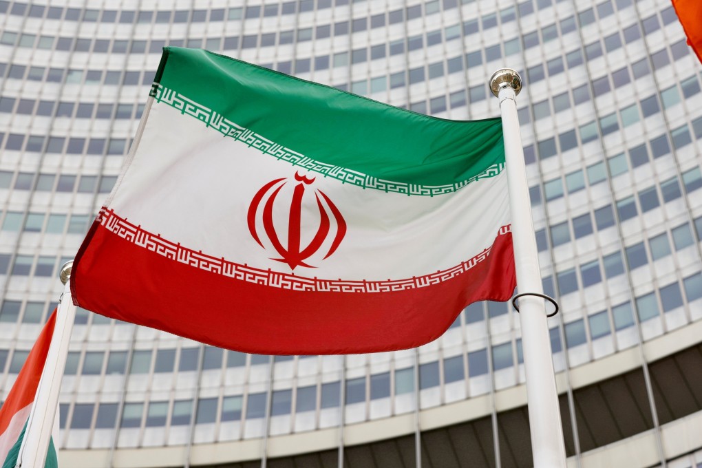 Iran’s flag is seen in front of the International Atomic Energy Agency’s headquarters in Vienna. Photo: Reuters